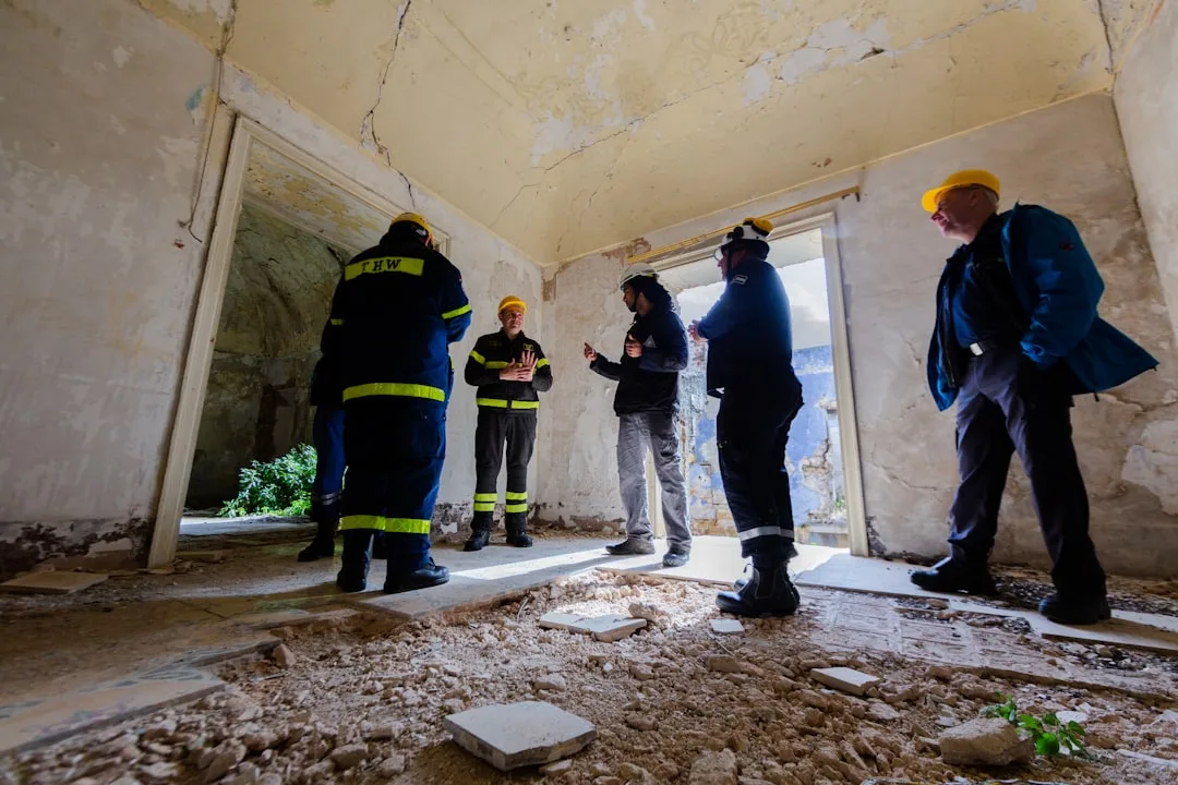 Structural engineers in disaster relief training in earthquake ruins